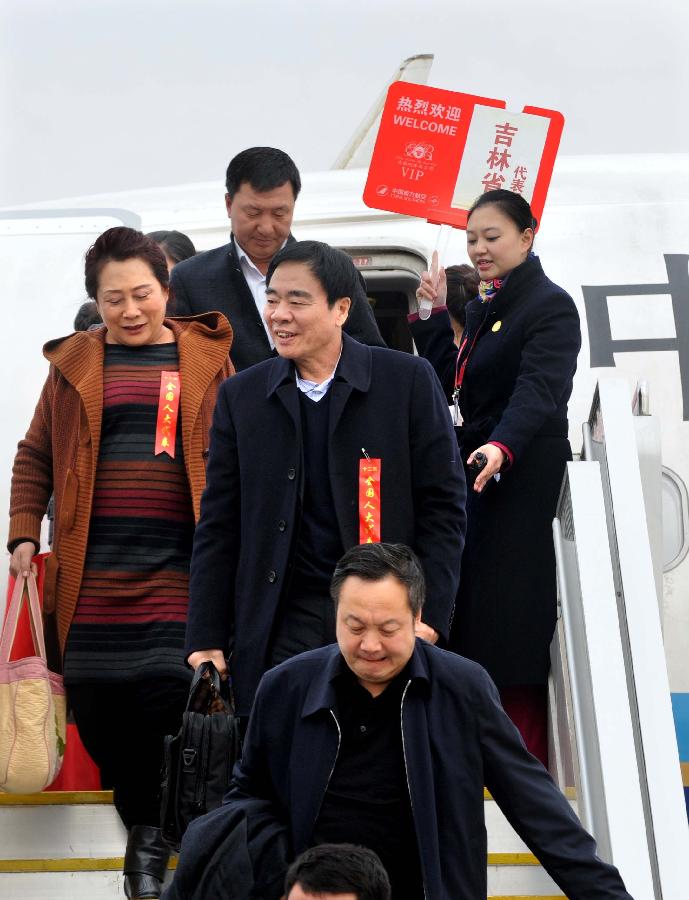 Deputies to the 12th National People's Congress (NPC) from northeast China's Jilin Province arrive in Beijing, capital of China, March 2, 2013. The first session of the 12th NPC is scheduled to open in Beijing on March 5. (Xinhua/Wang Song)