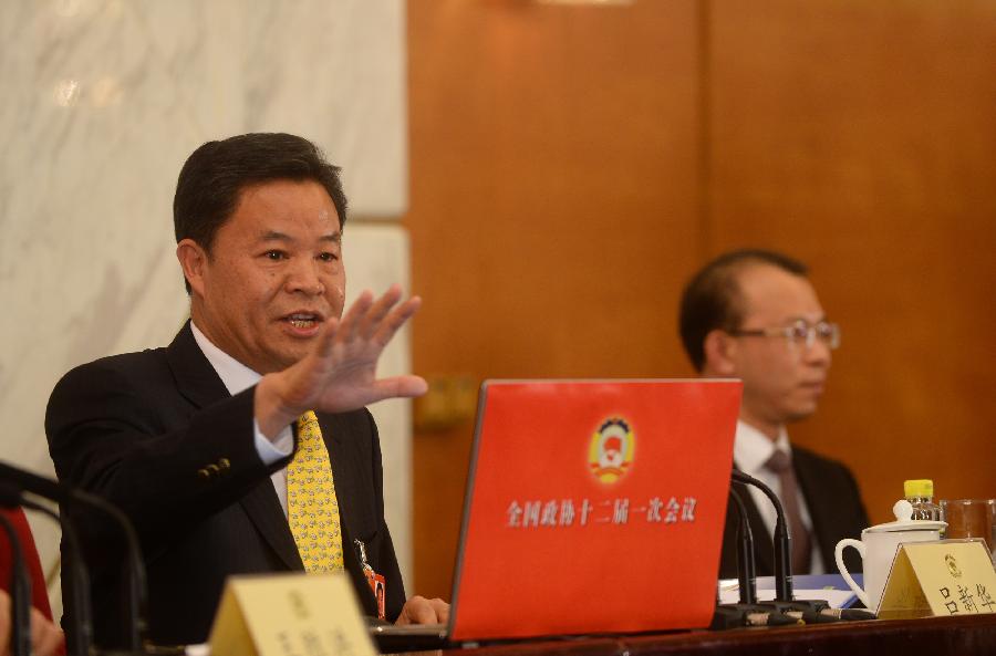 Lu Xinhua, spokesman of the first session of the 12th Chinese People's Political Consultative Conference (CPPCC) National Committee, speaks during a news conference on the CPPCC session in Beijing, capital of China, March 2, 2013. The first session of the 12th CPPCC National Committee is scheduled to open in Beijing on March 3. (Xinhua/Jin Liangkuai) 