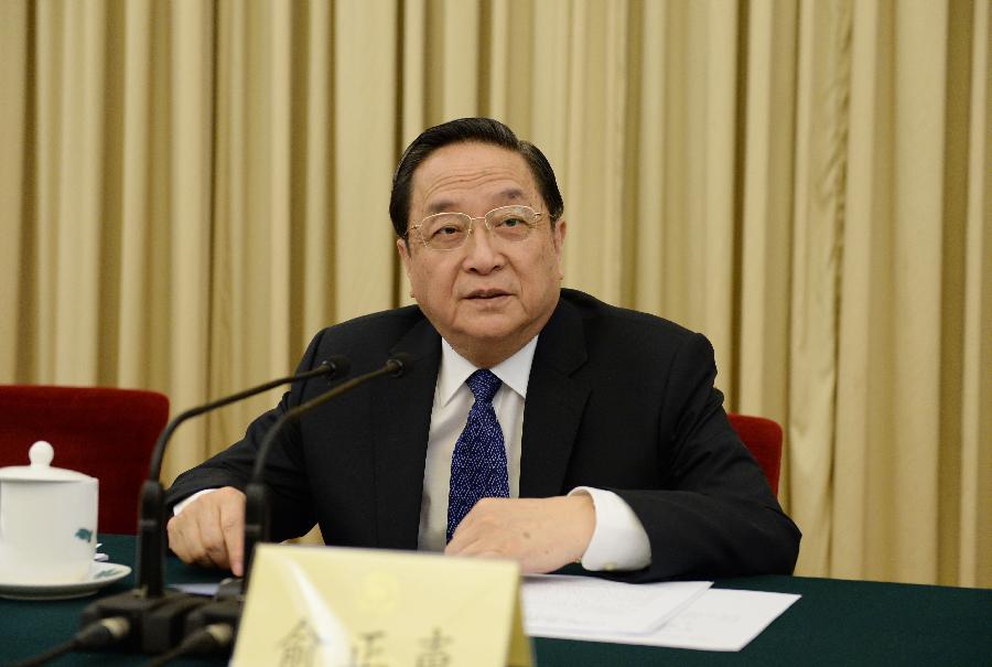 Yu Zhengsheng presides over the first meeting of the presidium of the first session of the 12th National Committee of the Chinese People's Political Consultative Conference (CPPCC) at the Great Hall of the People in Beijing, capital of China, March 2, 2013. (Xinhua/Li Xueren) 