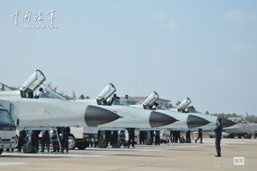 An aviation regiment under the South Sea Fleet of the Navy of the Chinese People's Liberation Army (PLA) conducts flight training and completes the flight training subjects under the background of actual combat. (navy.81.cn/Wanf Peng, Kou Yongqiang)  