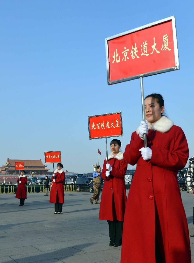 Staff members work at the Tian'anmen Square in Beijing, capital of China, March 3, 2013. The first session of the 12th National Committee of the Chinese People's Political Consultative Conference (CPPCC) opened in Beijing on March 3. (Xinhua/Wang Song) 