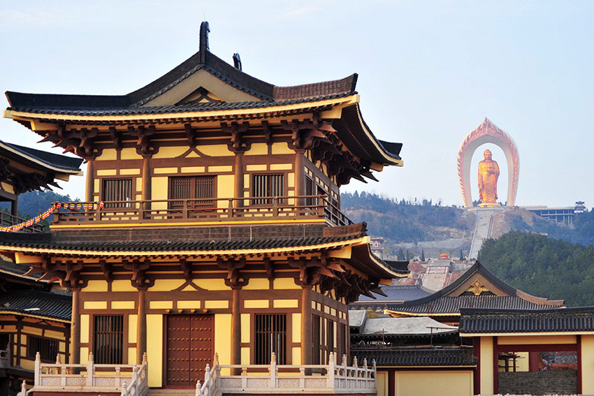 A 48-meter-high bronze statue of Amitabha Buddha is seen on the top of a hill in Xingzi County, Jiangxi Province, March 3, 2013. The gilding work of the statue is completed on Sunday. The Buddha statue has been recognized as the highest Amitabha Buddha in the world and the only outdoor Amitabha Buddha in China. A total of 48-kilogram gold has been used to gild the Statue. The overall style of the Amitabha Buddha imitates the Buddha statues in the Longmen Grottoes and it can be regarded as a fine religious art with the highest level in the modem society, according to the principal of the project. (CNS/Hu Guolin)