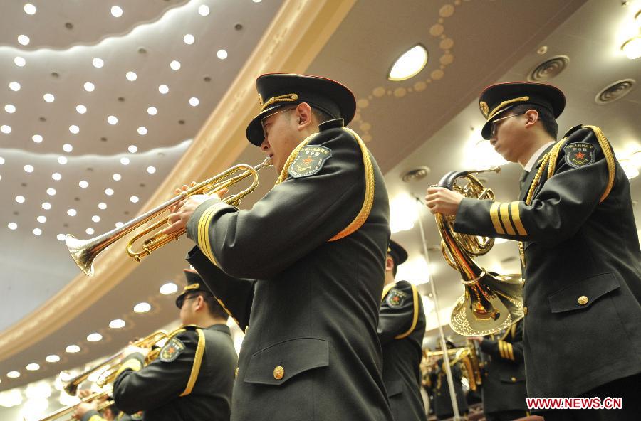 The military band plays the national anthem during the opening meeting of the first session of the 12th National People's Congress (NPC) at the Great Hall of the People in Beijing, capital of China, March 5, 2013. (Xinhua/Zheng Wei)