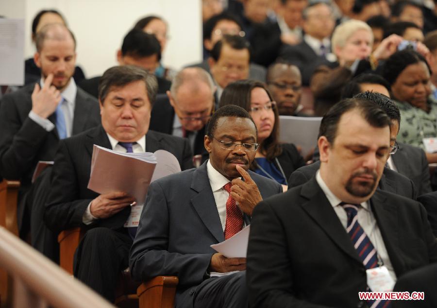 Foreign ambassadors and diplomats audit the opening meeting of the first session of the 12th National People's Congress (NPC) at the Great Hall of the People in Beijing, capital of China, March 5, 2013. (Xinhua/Xie Huanchi) 