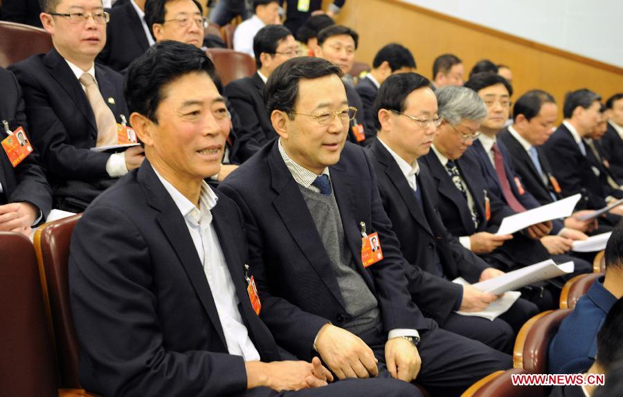 Members of the 12th National Committee of the Chinese People's Political Consultative Conference (CPPCC) attend the opening the meeting of the first session of the 12th National People's Congress (NPC) at the Great Hall of the People in Beijing, capital of China, March 5, 2013. (Xinhua/Chen Shugen)