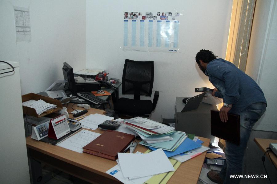 Photo taken on March 7, 2013, shows the damaged working unit and equipments inside the building of al-Assema TV channel in Tripoli, Libya, March 7, 2013. Unknown gunmen stormed the building of al-Assema TV channel in Libya Thursday afternoon, leaving four people kidnapped, witnesses told Xinhua. (Xinhua/Hamza Turkia) 