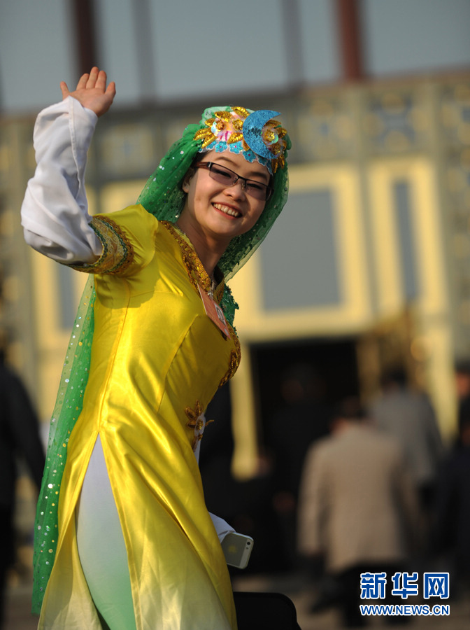 Tie Feiyan, a post-1990s deputy from Yunnan attends the first session of the 12th National People's Congress on March 5, 2013. (Photo/Xinhua)