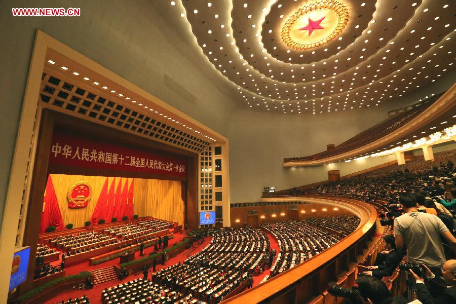 Zhang Gaoli (3rd R), a member of the Standing Committee of the Political Bureau of the Communist Party of China (CPC) Central Committee, joins a discussion with deputies to the 12th National People's Congress (NPC) from north China's Shanxi Province, who attend the first session of the 12th NPC, in Beijing, capital of China, March 8, 2013. (Xinhua/Xie Huanchi)