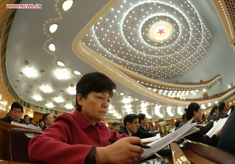 Shen Suli, a member of the 12th National Committee of the Chinese People's Political Consultative Conference (CPPCC), attends the third plenary meeting of the first session of the 12th CPPCC National Committee at the Great Hall of the People in Beijing, capital of China, March 8, 2013. Women's presence in China's politics has been increasing in recent decades. The number of female deputies to the 12th National People's Congress and members of the 12th National Committee of the Chinese People's Political Consultative Conference (CPPCC) rise to 699 and 399, reaching 23.4% and 18.4% of the total respectively. (Xinhua/Chen Jianli) 