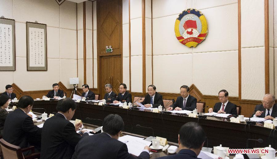 The meeting of executive chairpersons of the presidium of the first session of the 12th National Committee of the Chinese People's Political Consultative Conference (CPPCC) holds its first meeting in Beijing, capital of China, March 9, 2013. (Xinhua/Li Xueren)