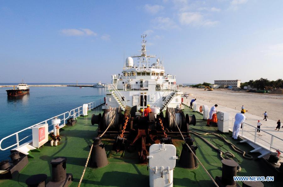 China Marine Surveillance ship Haijian 83 arrives at Yongxing Island of Sansha City, south China's Hainan Province, March 9, 2013. A marine surveillance fleet departed from Sanya in south China's Hainan Province Friday afternoon for regular patrols in the South China Sea. The team, consisting of three China Marine Surveillance (CMS) ships will patrol waters around the Xisha Islands for nine days. (Xinhua/Wei Hua)