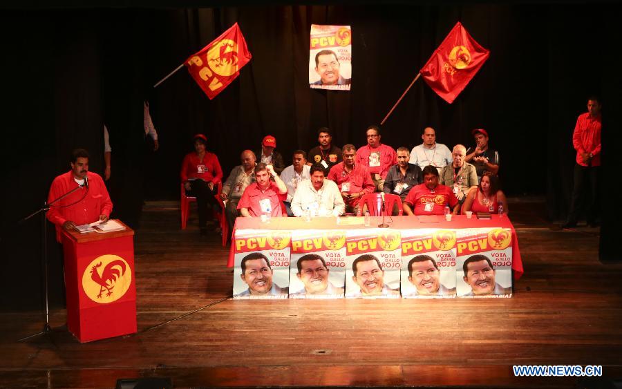 Image provided by the Presidency of Venezuela shows Venezula's Acting President Nicolas Maduro (L) giving a speech during the XII National Conference of the Communist Party of Venezuela, in Caracas, capital of Venezuela, on March 10, 2013. Venezuela's National Electoral Council (CNE) announced on Saturday after a special meeting of its Board of Directors that the presidential elections will be held on April 14. (Xinhua/Presidency of Venezuela) 