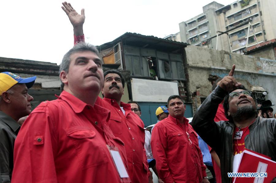 Acting President Nicolas Maduro (3rd L) attends the XII Venezuela's National Party Congress in Caracas, capital of Venezuela, on March 10, 2013. Venezuela's National Electoral Council (CNE) announced on Saturday after a special meeting of its Board of Directors that the presidential elections will be held on April 14. (Xinhua/AVN) 