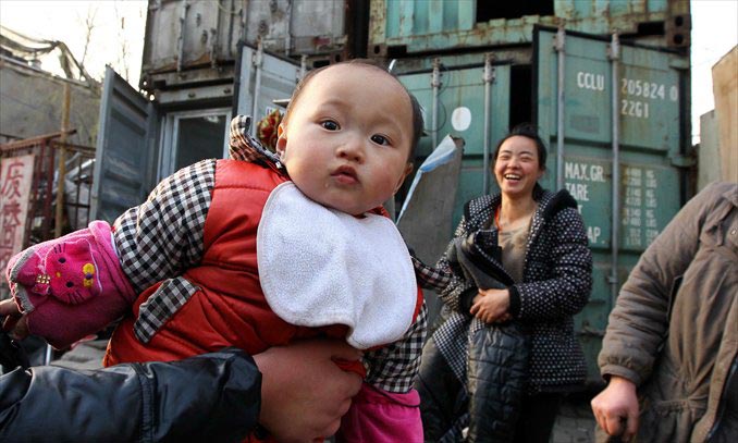 One of the families takes stock of recycled items. Photo: Yang Hui/GT