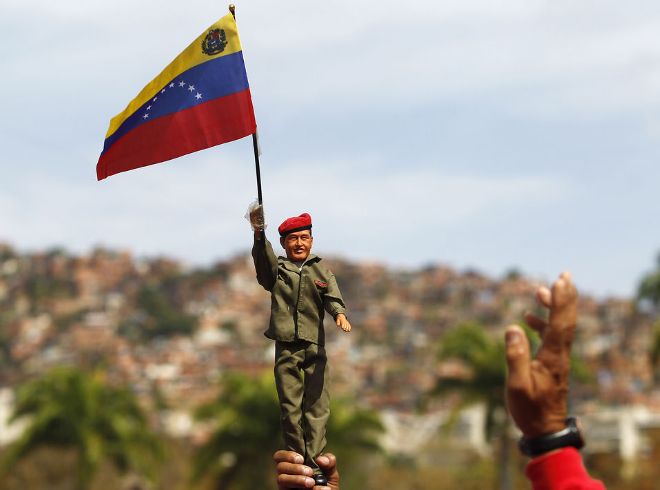 Supporters of Venezuela's late president Hugo Chavez wait for a chance to view his body at the military academy in Caracas March 8, 2013. (Xinhua News Agency/Reuter)