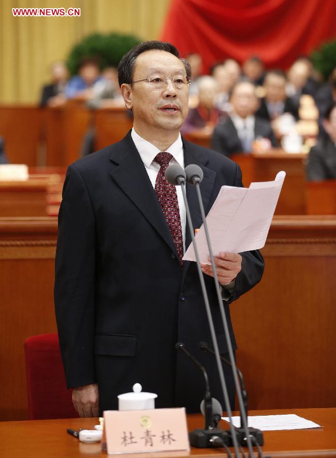 Du Qinglin presides over the fourth plenary meeting of the first session of the 12th National Committee of the Chinese People's Political Consultative Conference (CPPCC) held at the Great Hall of the People in Beijing, capital of China, March 11, 2013. Chairman, vice-chairpersons, secretary-general and Standing Committee members of the 12th CPPCC National Committee will be elected Monday afternoon. (Xinhua/Ju Peng)