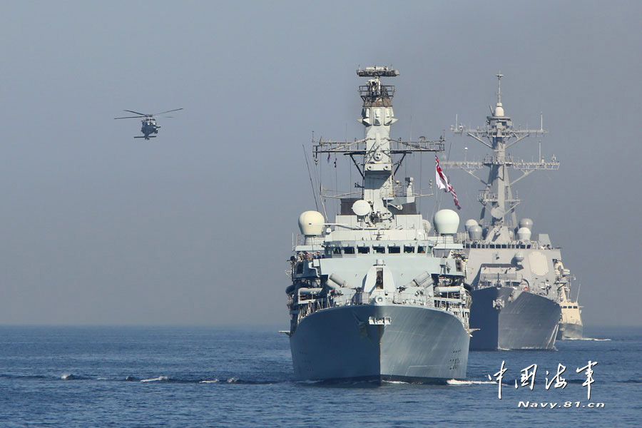 24 warships from 14 countries including China, Pakistan, the United States, the United Kingdom and Japan participate in the "Peace-13" multinational maritime joint military exercise and conduct live-ammunition firing training on the sea on March 7, 2013. (navy.81.cn/Wang Changsong)