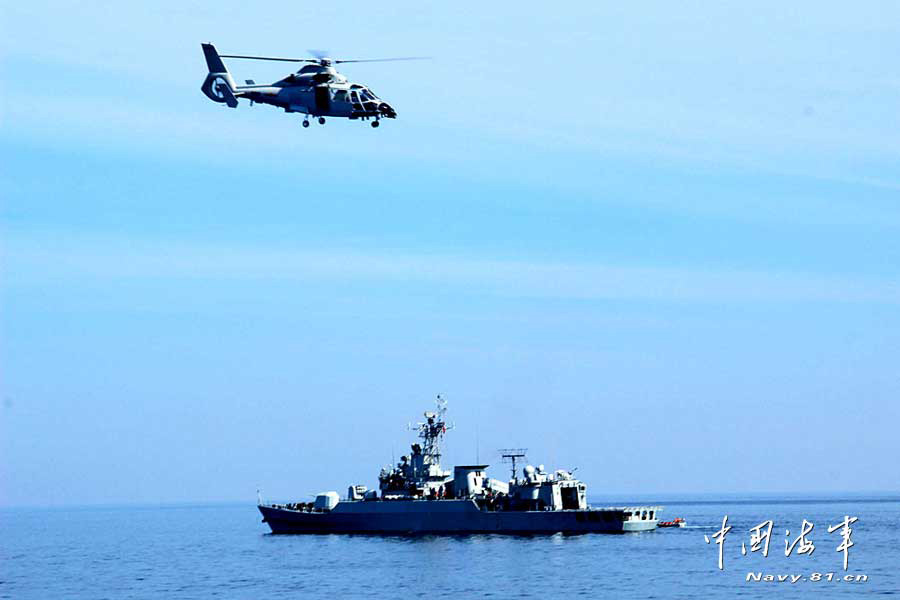 The 14th escort taskforce of the Navy of the Chinese People's Liberation Army (PLA) participates in an anti-hijack exercise on the March 10, 2013, local time, while sailing in the Arabian Sea area on the voyage to the Gulf of Aden. (navy.81.cn/Wang Changsong, Li Ding)