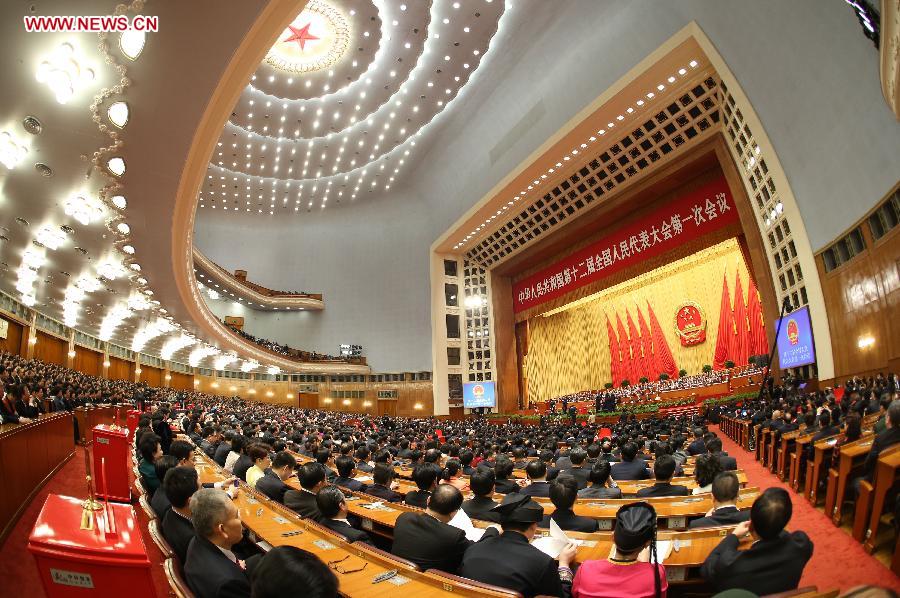 The fourth plenary meeting of the first session of the 12th National People's Congress (NPC) is held at the Great Hall of the People in Beijing, capital of China, March 14, 2013. Chairman, vice-chairpersons, secretary-general and members of the 12th NPC Standing Committee, president and vice-president of the state, and chairman of the Central Military Commission of the People's Republic of China will be elected here on Thursday. (Xinhua/Chen Jianli)