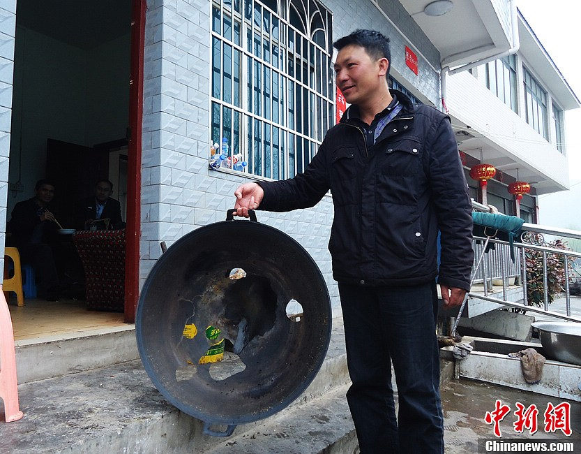 The most severe hail for centuries hits Guiding county in southwest China's Guizhou province on March 12, 2013. It has caused a direct economic loss of 14.73 million yuan. The strong hail lasted for about 30 minutes. The hailstones measured between 3 and 4 centimeters in diameter, with the biggest ones being 7 centimeters. Five villages were affected, with houses, crops, living facilities, forests damaged in varying degrees. (Chinanews/Chen Guangfei)