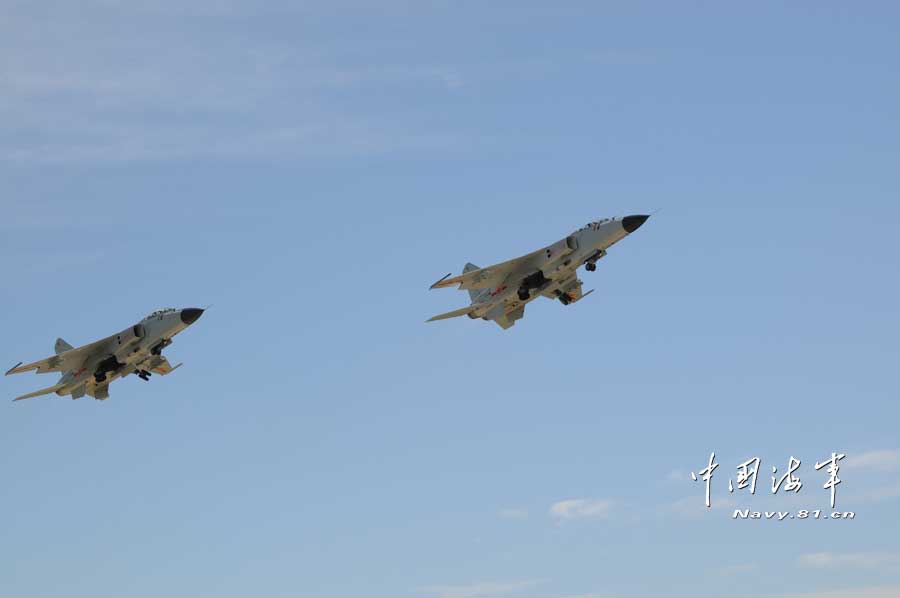 The photo shows FBC-1 fighter-bombers, also known as "Flying Leopard", in the multi-subjects joint training under the background of actual combat. (China Military Online/ Zhang Qun)  