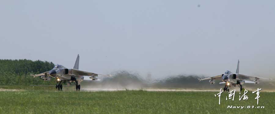 The photo shows FBC-1 fighter-bombers, also known as "Flying Leopard", in the multi-subjects joint training under the background of actual combat. (China Military Online/ Zhang Qun)  