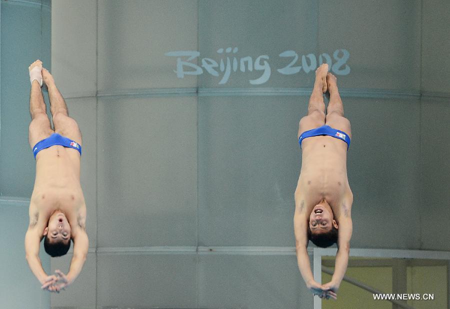 Ivan Garcia and Adan Zuniga of Mexico compete during the Men's 10m Platform Synchro Final in the FINA Diving World Series 2011-Beijing at National Aquatics Center in Beijing, China, March 15, 2013. Ivan Garcia and Adan Zuniga won the bronze medal with 403.47 points. (Xinhua/Tao Xiyi) 