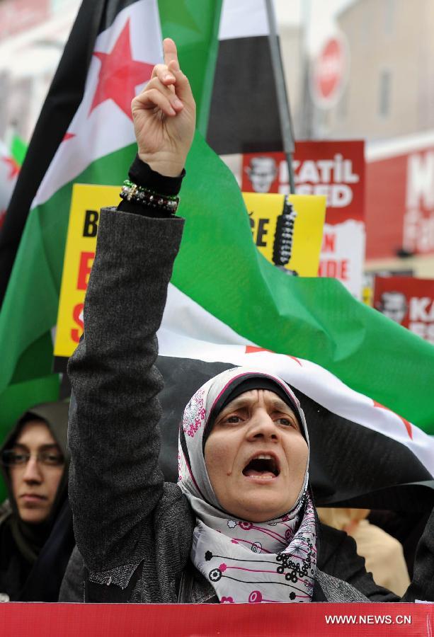 A protester chants slogans during a demonstration in Istanbul, Turkey, on March 15, 2013. More than 1,000 Turks and Syrians held a rally in Turkey's Istanbul city in protest of the Syrian government on Friday, two years after the unrest broke out in Syria. (Xinhua/Ma Yan) 