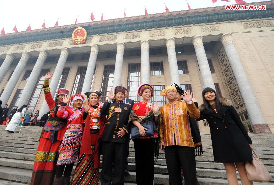 Deputies to the 12th National People's Congress (NPC) pose for a photo in front of the Great Hall of the People in Beijing, capital of China, March 17, 2013. The closing meeting of the first session of the 12th NPC will be held in Beijing on Sunday. (Xinhua/Yang Qing)