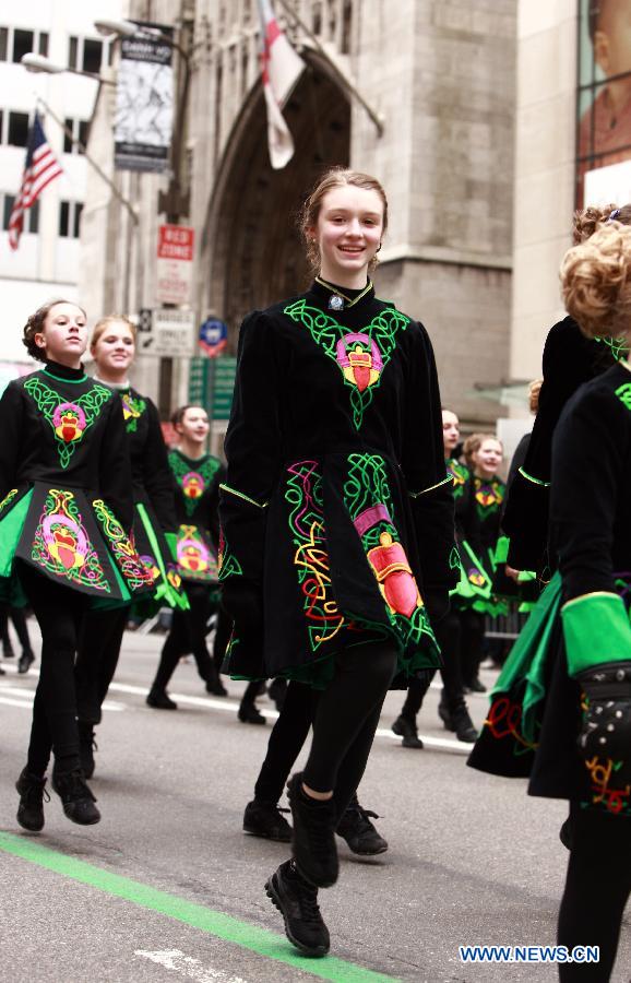 Parade participants march along the 5th Ave during the 252nd annual St. Patrick's Day Parade in New York City on March 16, 2013. (Xinhua/Zhai Xi) 