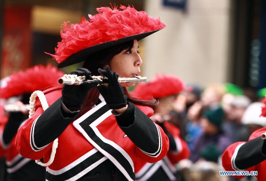 Parade participants march along the 5th Ave during the 252nd annual St. Patrick's Day Parade in New York City on March 16, 2013. (Xinhua/Zhai Xi) 