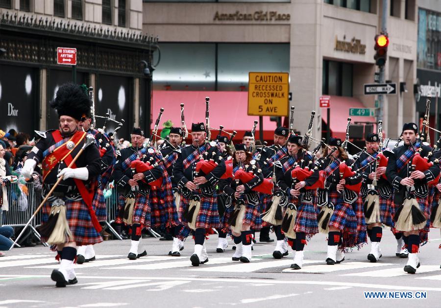 Parade participants march along the 5th Ave during the 252nd annual St. Patrick's Day Parade in New York City on March 16, 2013. (Xinhua/Zhai Xi)