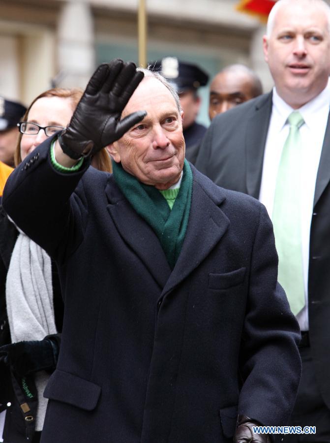 New York mayor Micheal Bloomburg marches with revellers during the 252nd annual St. Patrick's Day Parade in New York City on March 16, 2013. (Xinhua/Cheng Li) 