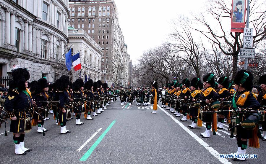 Parade participants march along the 5th Ave during the 252nd annual St. Patrick's Day Parade in New York City on March 16, 2013. (Xinhua/Cheng Li) 