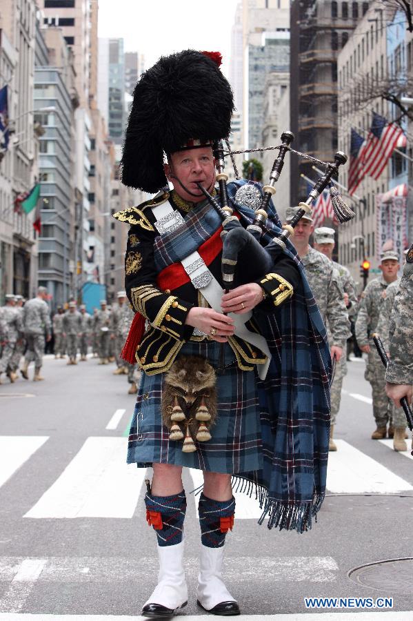 Parade participants march along the 5th Ave during the 252nd annual St. Patrick's Day Parade in New York City on March 16, 2013. (Xinhua/Cheng Li) 