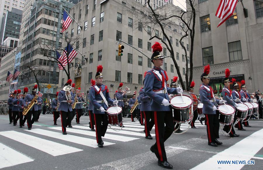 Parade participants march along the 5th Ave during the 252nd annual St. Patrick's Day Parade in New York City on March 16, 2013. (Xinhua/Cheng Li) 