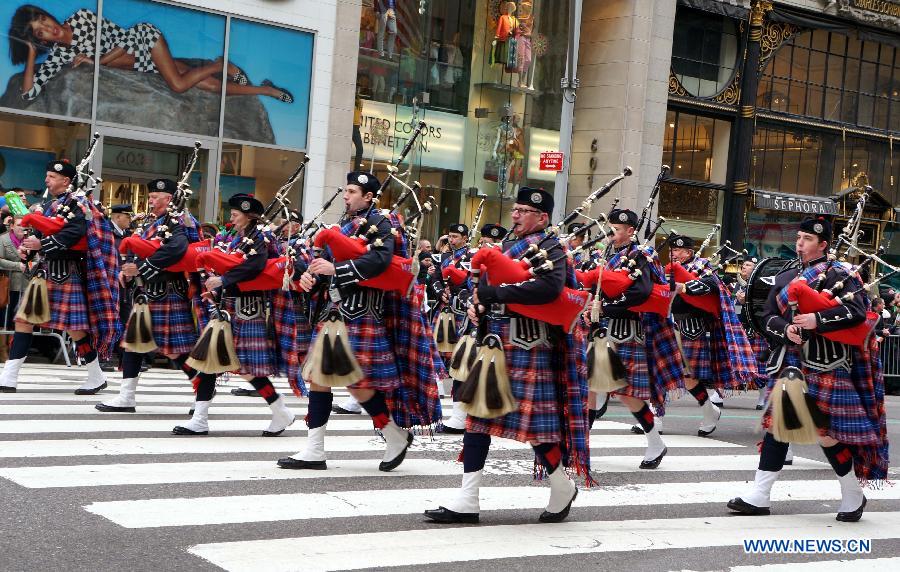 Parade participants march along the 5th Ave during the 252nd annual St. Patrick's Day Parade in New York City on March 16, 2013. (Xinhua/Zheng Xiaoning) 