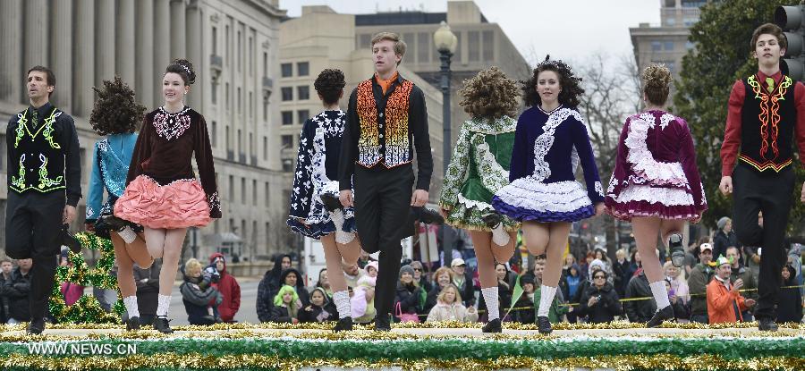 Revelers dance during the annual St. Patrick's Parade in Washington D.C., capital of the United States, March 17, 2013. (Xinhua/Zhang Jun)