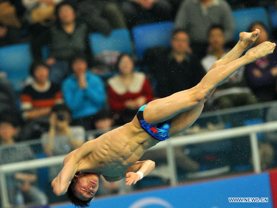 Lin Yue of China competes during the men's 10m platform final at the FINA Diving World Series 2013 held at the Aquatics Center, in Beijing, capital of China, on March 17, 2013. Lin Yue claimed the title with 555.55 points. (Xinhua/Gong Lei)