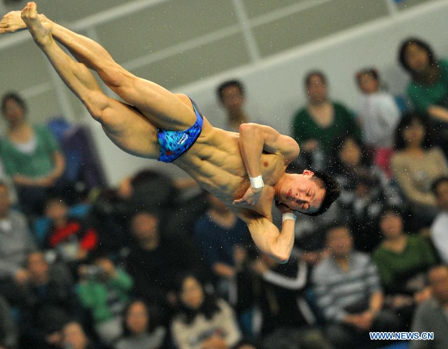 Lin Yue of China competes during the men's 10m platform final at the FINA Diving World Series 2013 held at the Aquatics Center, in Beijing, capital of China, on March 17, 2013. Lin Yue claimed the title with 555.55 points. (Xinhua/Gong Lei)