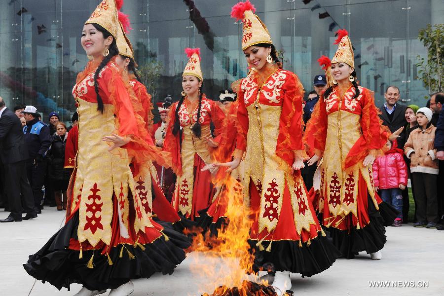 Artists perform at Nevruz celebrations in Istanbul, Turkey, on March 17, 2013. The Nevruz performance, organized by the Joint Administration of Turkic Arts and Culture (TURKSOY), brings together more than 250 artists from different countries or regions to celebrate Nevruz in 15 cities of Turkey. (Xinhua/Ma Yan)