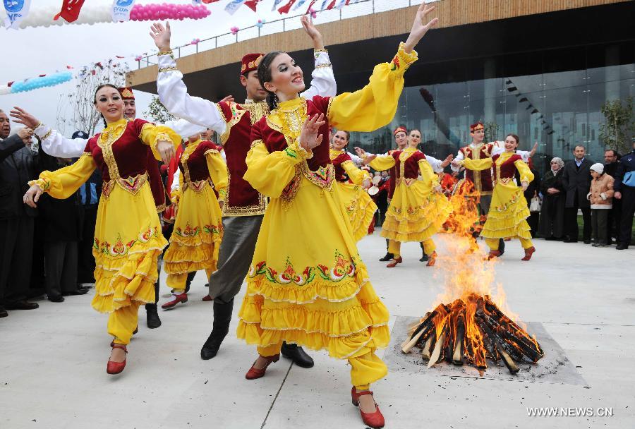 Artists perform at Nevruz celebrations in Istanbul, Turkey, on March 17, 2013. The Nevruz performance, organized by the Joint Administration of Turkic Arts and Culture (TURKSOY), brings together more than 250 artists from different countries or regions to celebrate Nevruz in 15 cities of Turkey. (Xinhua/Ma Yan)