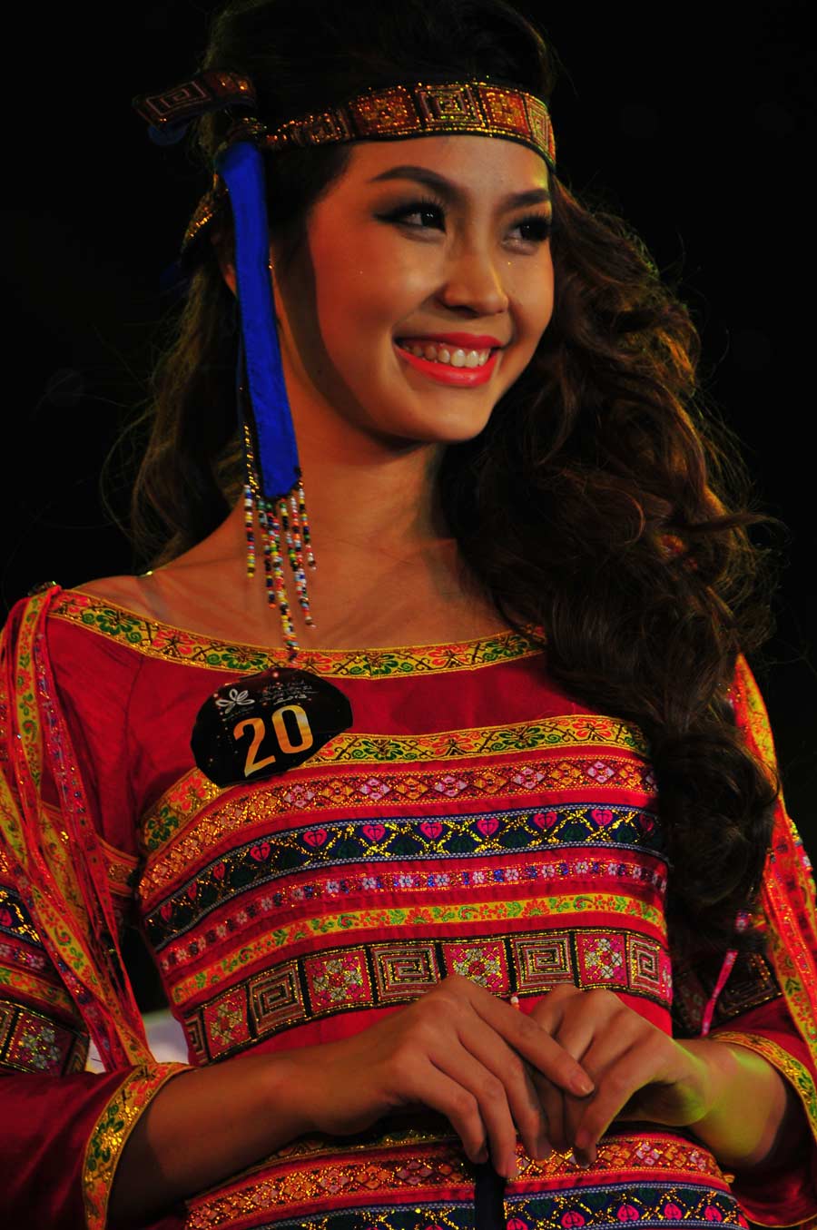 A Vietnamese girl attends "Coffee Queen" beauty contest held in Buon Ma Thuot, Vietnam, March 10, 2013. The activity is one of coffee themed festival series. The winner of the contest will participate as ambassador in the international promotion activities of Vietnam coffee culture. (Xinhua/Zhang Jianhua)