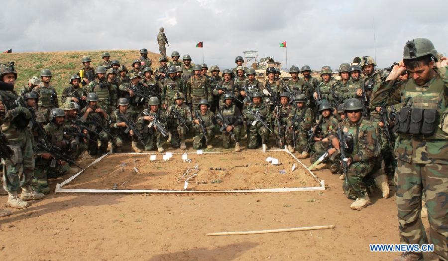 Afghan Army Commandos take part in a military rehearsal in Mazar-e-Sharif, Balkh province, north Afghanistan, March 16, 2013. Several hundreds of Afghan National Army (ANA) commandos participated in a one-day military exercise here on Saturday. (Xinhua/Azorda)