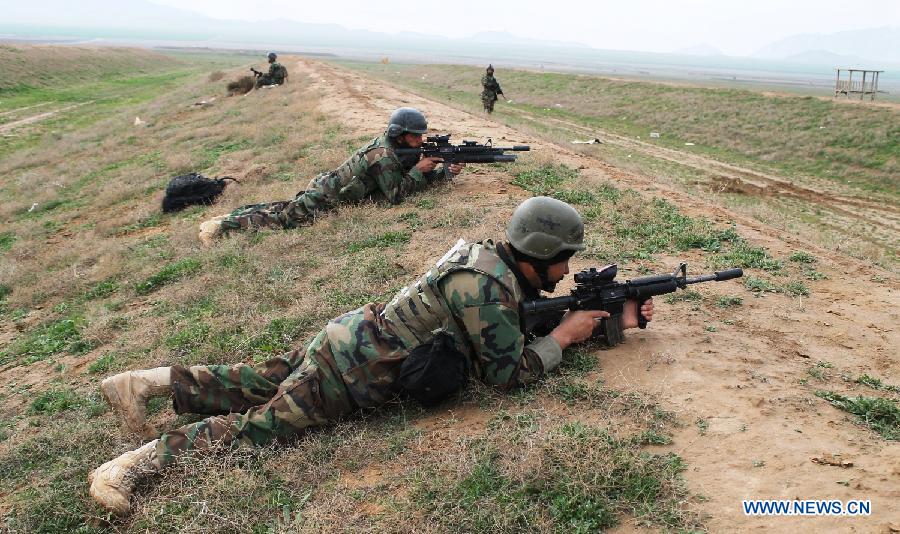 Afghan Army Commandos take part in a military rehearsal in Mazar-e-Sharif, Balkh province, north Afghanistan, March 16, 2013. Several hundreds of Afghan National Army (ANA) commandos participated in a one-day military exercise here on Saturday. (Xinhua/Azorda)