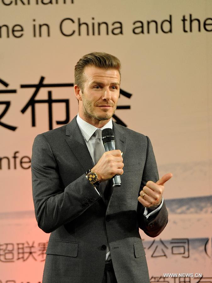 British footballer David Beckham reacts during a press conference in Beijing, capital of China, on March 20, 2013. David Beckham came to China as the ambassador for the youth football Program in China and the Chinese Super League (CSL). (Xinhua/Cao Can)