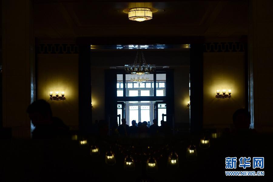 The lights and their reflection at the Great Hall of the People look like a smiling face. (Xinhua/ Jin Liangkuai)