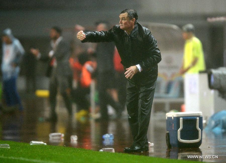 Jose Antonio Camacho Alfaro, head coach of the Chinese team, reacts during the 2015 AFC Asian Cup qualifier football match between China and Iraq in Changsha, capital of central China's Hunan Province, March 22, 2013. China won 1-0. (Xinhua/Guo Yong) 