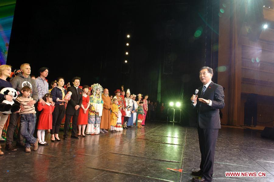 Visiting Chinese Vice Premier Wang Yang (R) meets the performers during his inspection of the preparations for the "Tourism Year of China" in Moscow, Russia, March 21, 2013. Chinese Vice Premier Wang Yang, who is visiting Moscow to inspect preparations for the "Tourism Year of China" in Russia, has called for enhanced tourism cooperation between China and Russia. (Xinhua/Jiang Kehong)