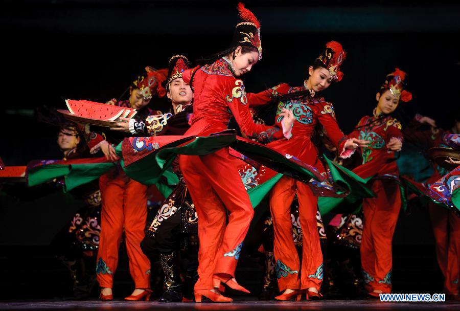 Artists perform during the opening ceremony of the "Tourism Year of China" in Moscow, March 22, 2013. The "China-Russia Tourism Year" program, which began last year with the "Tourism Year of Russia" in China, aims to foster tourism ties and humanistic exchanges between the two countries. (Xinhua/Jiang Kehong)